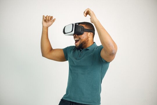Black guy with virtual reality glasses isolated on white background