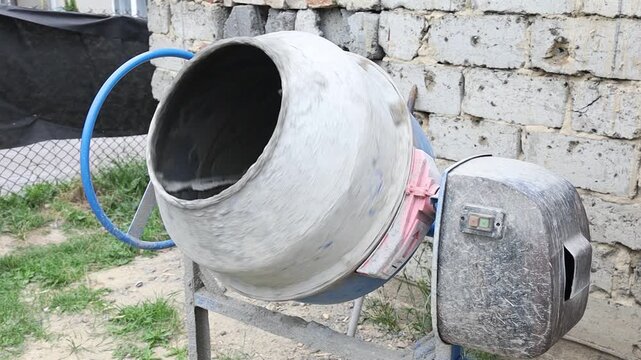Cement mixer working at a construction site