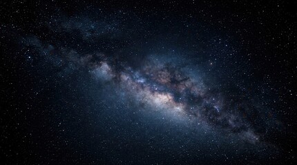 Dark night texture featuring sparkling celestial stars and the milky way © tanin