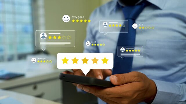 Businessman uses a smartphone with hologram floating five-star rating, review and customer feedback icons in a modern office, Holographic checking customer ratings on smartphone