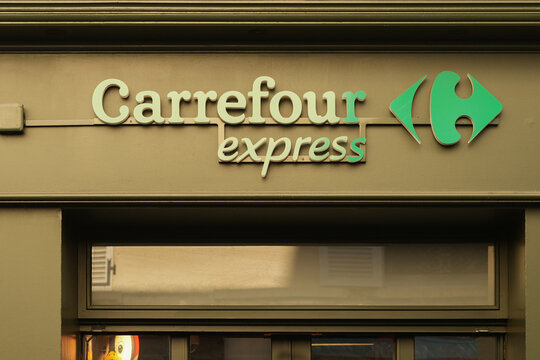 PARIS, FRANCE - JANUARY 03, 2026 Carrefour Express storefront market in a French town