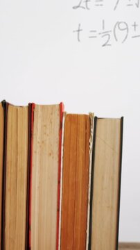 Animation of books over mathematical equations and formulae