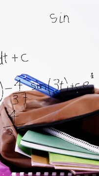 Animation of school items over mathematical equations and formulae