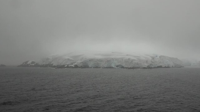 Massive Glacier-Covered Island under Low Clouds in the Melchior Islands, Antarctica
