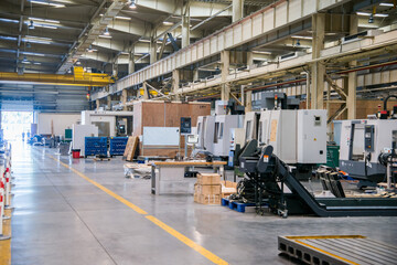 Naklejka premium Industrial Manufacturing Factory Workshop with CNC Machines and Production Line