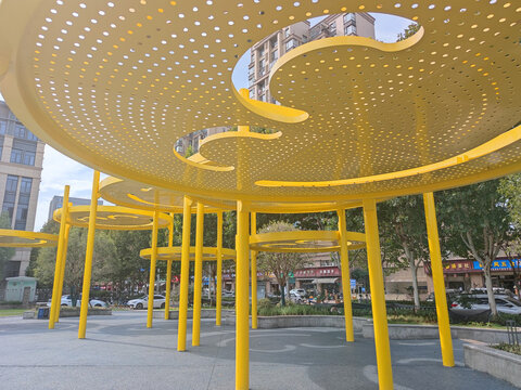 Yellow Modern Art Installation in Urban City Square