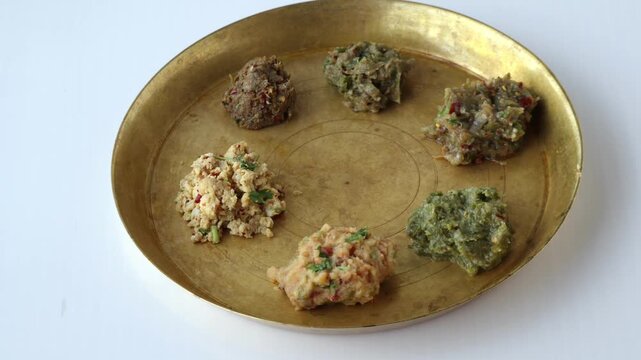 Assorted Bengali Vorta Platter with Potato, Eggplant, Lentil, Egg, Green Bean, and Dried Fish Mash - Authentic Bangladeshi Cuisine Concept