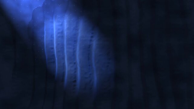Blue spotlight on a dark muslin studio backdrop, folds of fabric in a soft beam of light with drifting haze, seamless loop background with copy space