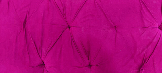 Obraz premium Magenta velvet tufted upholstery texture, luxury pink fabric headboard background, elegant quilted textile material for interior design