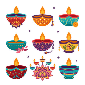 Colorful traditional Indian Diwali oil lamps with decorative designs.
