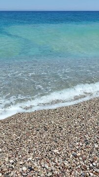 Paralia Enidriou Beach in Rhodes town in Greece. Rhodes coast landscape in sunny weather. Greek Island.