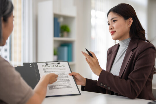 Brokers, insurance agents, or financial planners discuss and provide advise about health insurance for senior people.