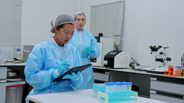 Healthcare experts collaborating on research discoveries in a contemporary lab environment
