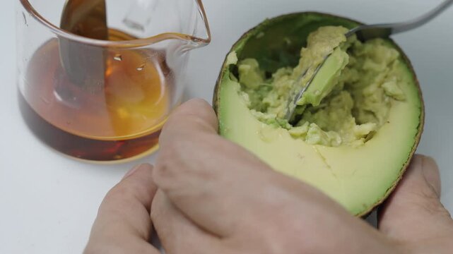 Avocado whth Honey, Eating or Alternative therapy spa treatment.