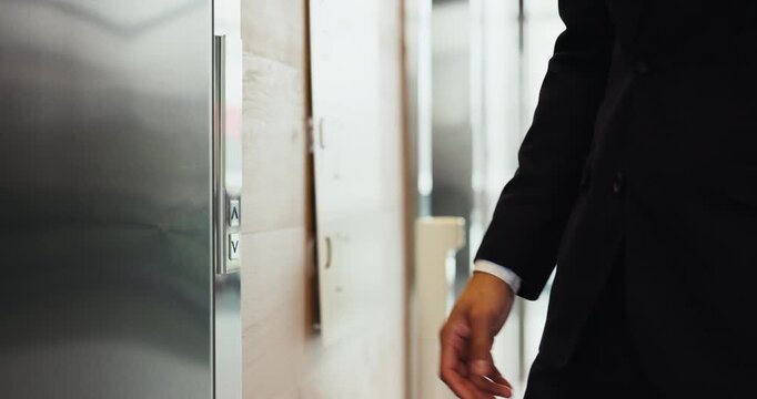Closeup, person and hands with press for elevator, mechanical metal and transport with technology. Business, employee and floor request with button for destination, lift level and worker in office