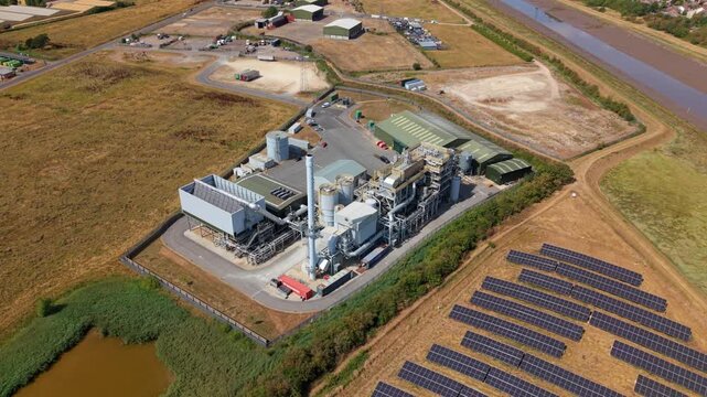 Top Down Aerial View of Solar Panels Beside Energy Recovery Plant in the UK