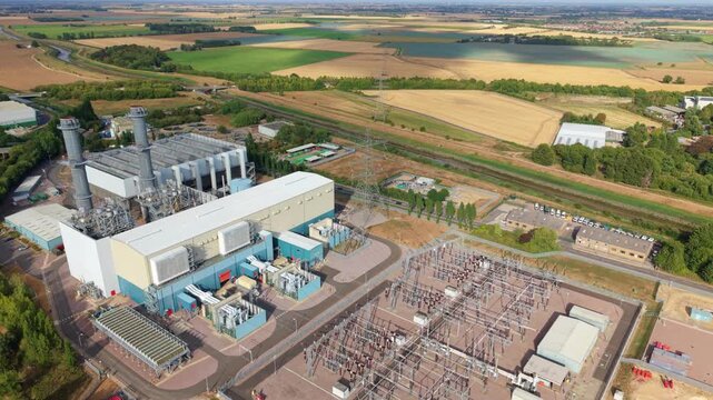 Spalding gas power station and electrical substation in an aerial view across the rural fens of Lincolnshire, England, UK