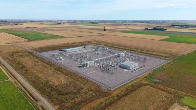 Aerial view of Triton Knoll offshore wind farm onshore substation in expansive rural fenland Lincolnshire UK