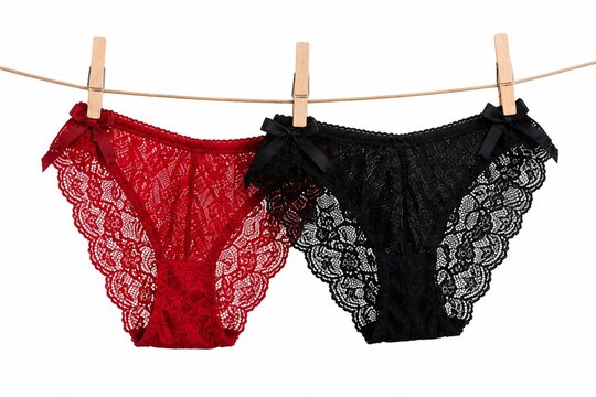 Red and black lace underwear hanging on clothesline