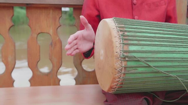 Hand Hit Drum To Make Lao Music