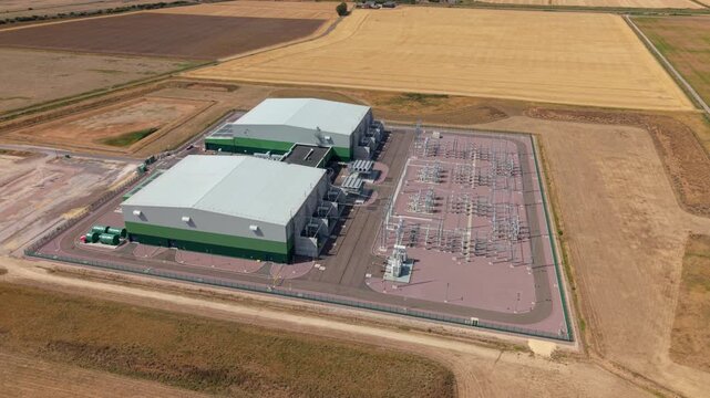 Aerial view of Viking Link HVDC converter station surrounded by expansive rural farmland Lincolnshire UK