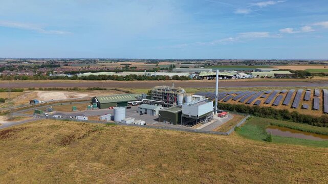 Top Down Aerial View of Solar Panels Beside Energy Recovery Plant in the UK