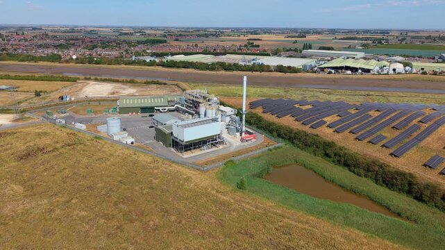 Top Down Aerial View of Solar Panels Beside Energy Recovery Plant in the UK