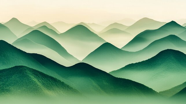 Misty green mountain range at sunrise.