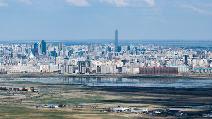 Obraz premium Panoramic view of Astana, Kazakhstan, featuring the modern city skyline and urban architecture.