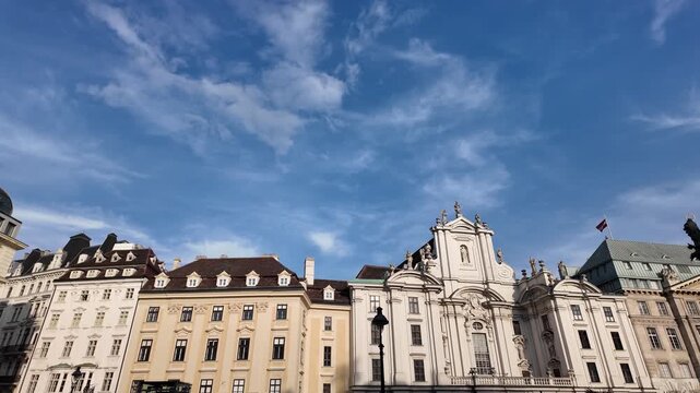 Aesthetic cinematic slow motion view of the square and Kirche am Hof facade in Vienna