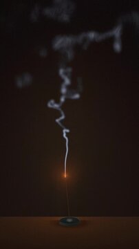 Incense smoke rising from a burning stick