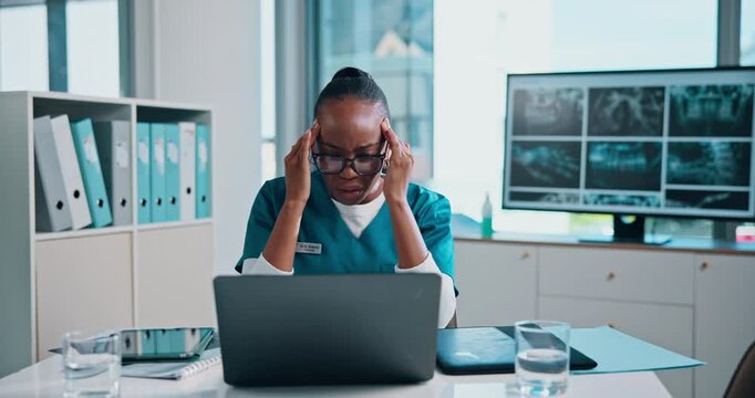 Frustrated, black woman or doctor with stress on laptop for deadline, pressure or strain at office desk. Female person, healthcare employee or nurse with computer for mistake, loss or grief at clinic