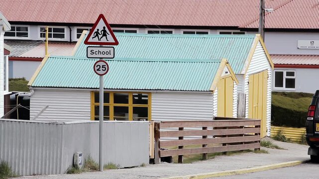School Zone Warning Sign And Traffic Sign In Falkland Islands (Islas Malvinas) - 4K 