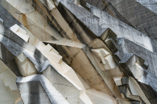 Tjentiste, Bosnia and Herzegovina - 16 June 2025: View of the brutalist concrete architecture of the Tjentiste War Memorial, featuring sharp geometric angles and weathered textures.