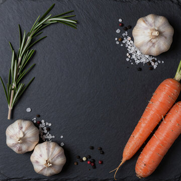 Fresh rustic kitchen food ingredients with central copy space