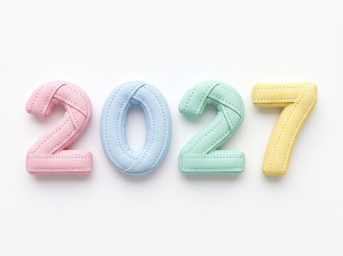 2027 New Year Celebration Concept with Plush Pastel Felt Numbers Confetti and Ribbons Flatlay 6