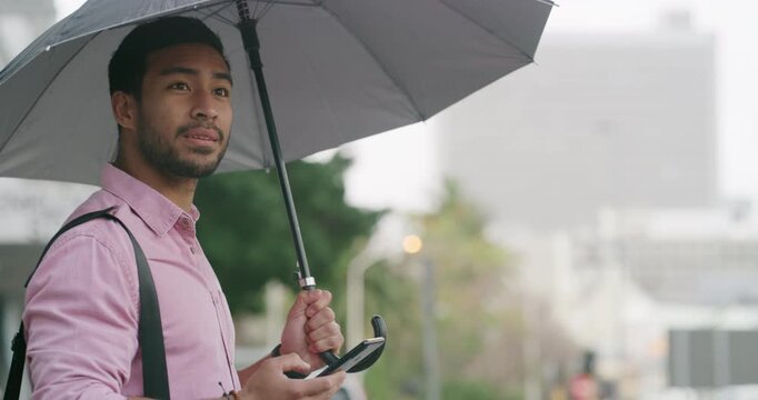 Phone, umbrella and walking with man in city for ehailing service, taxi cab app search and communication. Location, networking and rider request with person and mobile for transport tracking