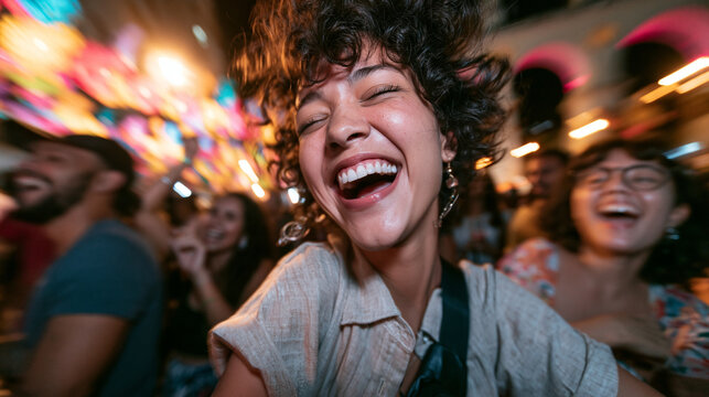 Ecstatic Young Woman Laughing at Outdoor Night Festival