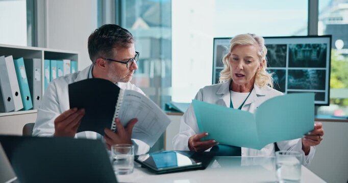 Doctor, team or x ray with documents for medical procedure, patient history or clinic report at hospital. Man, woman or healthcare surgeons with CT scan, test results or exam for radiology or autopsy