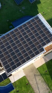 Solar Energy Technology Center with Rooftop Solar Panels, Ground-Mounted Arrays and Photovoltaic Research Systems in Florian&oacute;polis, Brazil. Aerial View.