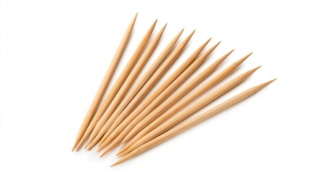 Wooden toothpicks fanned out and isolated on a white background