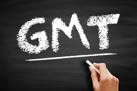 GMT stands for Greenwich Mean Time, representing the mean solar time at the Royal Observatory in Greenwich, London, used as a global time standard on this chalkboard
