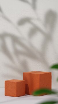 Elegant Cosmetics Product Presentation Scene made with Two Terracotta Cubes in Leaf Shadow 