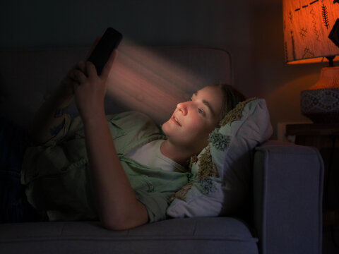 Woman is addicted to use smartphone