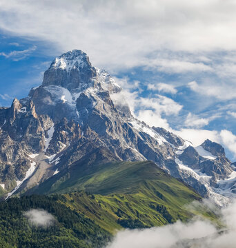 Panoramic summer landscape with Ushba mountain snowy peaks (4710m), Caucasus Mountains, Zemo Svaneti, Georgia	