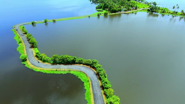 Iconic landscape of Veliyanad in Kerala&rsquo;s Kuttanad region flooded polder fields (padasekharams),Kuttanad&rsquo;s below-sea-level ecosystem, monsoon waterlogging,ural transport, backwater scenery