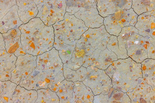 Aerial view of the cracked earth and rocky surface of the Ustyurt Plateau in Karakiya District, Mangystau Region, Kazakhstan.