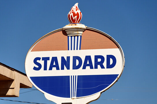 An old, vintage Standard Oil petroleum company sign on display in a north central Illinois community. The sign  is a remnant of those dispayed at gas stations throughout the United States.