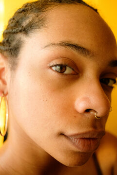 Young Black woman portrait in golden light