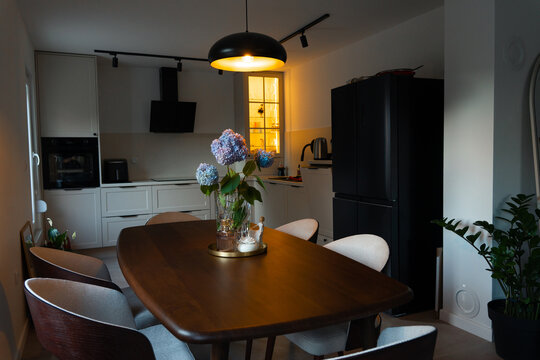Contemporary Kitchen and Dining Room with fresh flowers